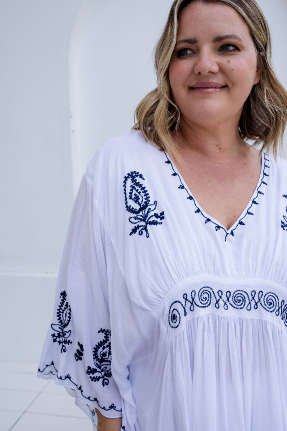 black-embroidery-on-white-kaftan-top