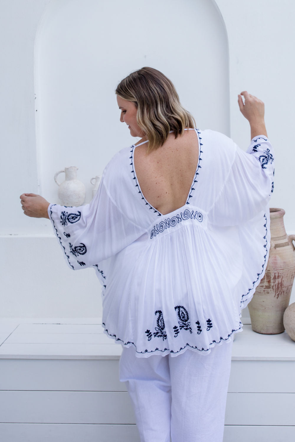 kaftan-top-white-black-embroidery-back-open-feature  1000 × 1500px