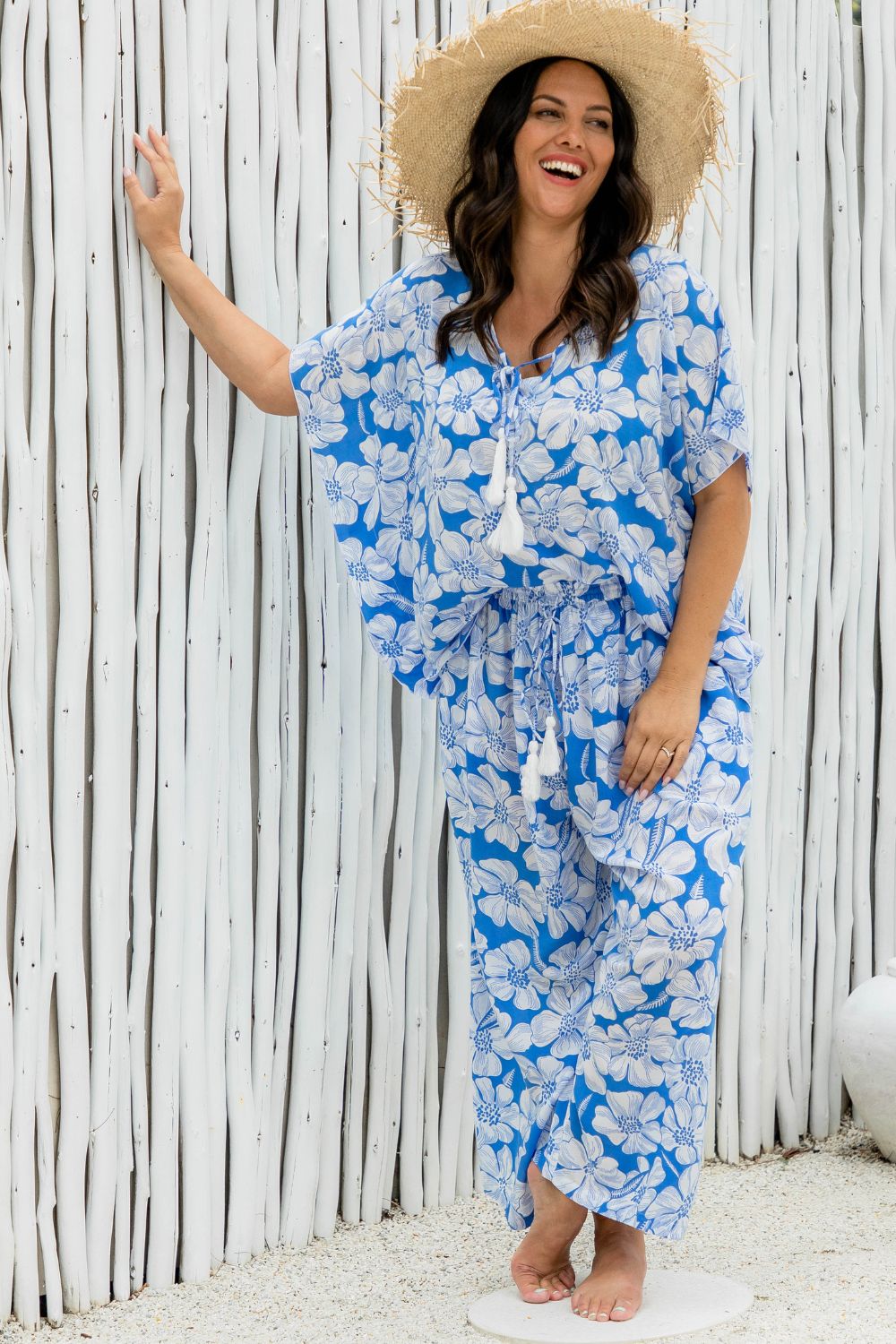 lady wearing blue floral outfit of kaftan top and palazzo relaxed fit pants