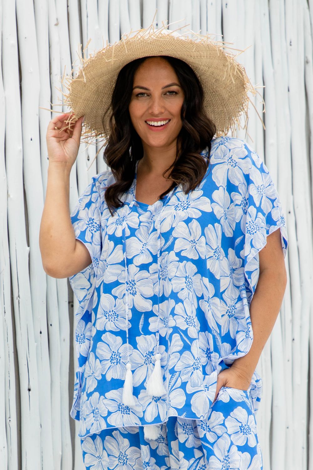 lady wearing blue floral kaftan top for summer