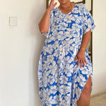 Woman wearing a blue floral dress in Bali villa