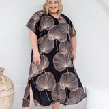 Analyzing image      long-summer-dress-plus-size-black-cream-leaf-design