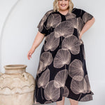 Analyzing image     plus-size-long-summer-dress-black-cream-leaf-design