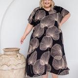 Analyzing image     plus-size-long-summer-dress-black-cream-leaf-design