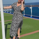 Woman-wearing-the-Sorrento-long-summer-dress-in-black-and-white-whilst-on-Carnival-cruise-of-Queensland-coast
