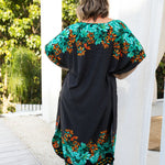 long-kaftan-dress-black-polka-orange-green-floral-back