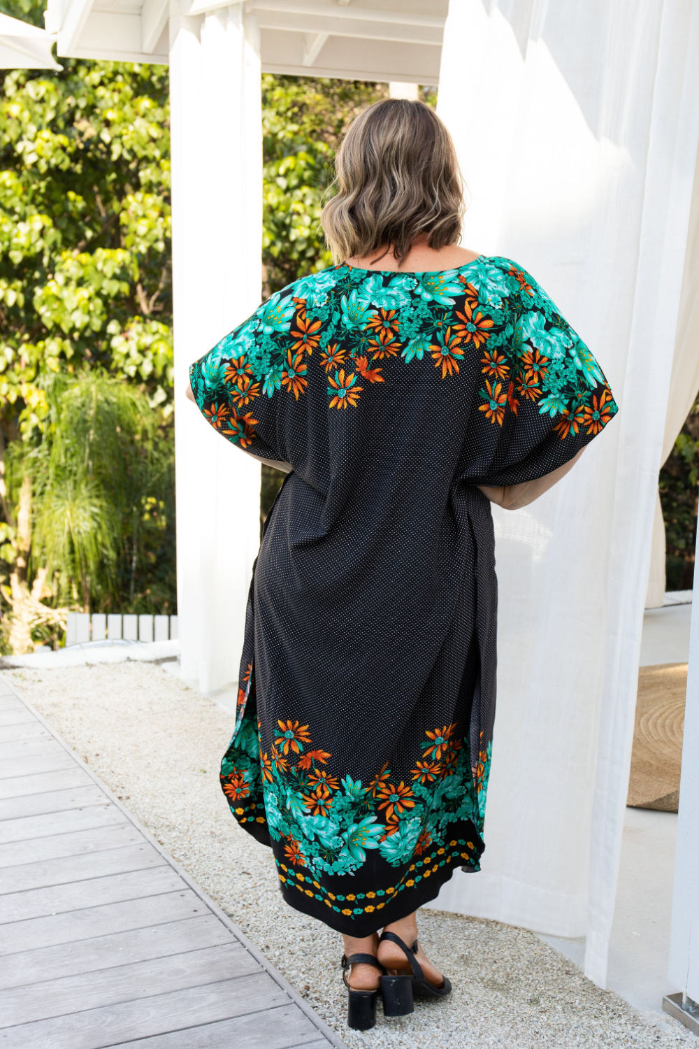 long-kaftan-dress-black-polka-orange-green-floral-back