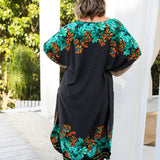long-kaftan-dress-black-polka-orange-green-floral-back