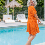 short-summer-dress-orange-white-polka