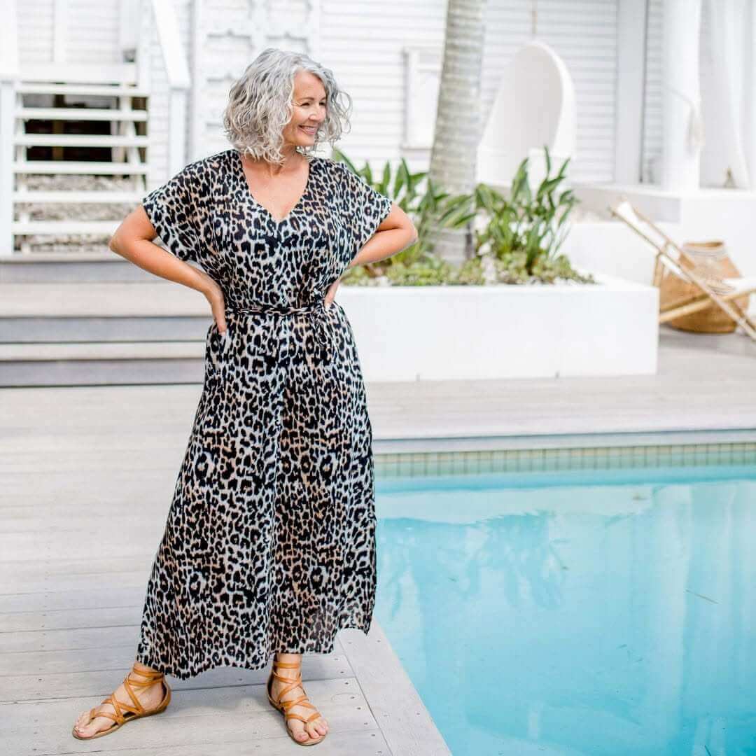 Model wearing Holley Day Signature Leopard print resort wear in belted Maxi Kaftan Dress design
