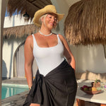 woman wearing xl black sarong at Bali pool villa