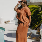 Side view of Kate in Mocha Mousse Blouse Co-Ord Set size XL showing drape of blouse over matching pants and true wide-leg silhouette