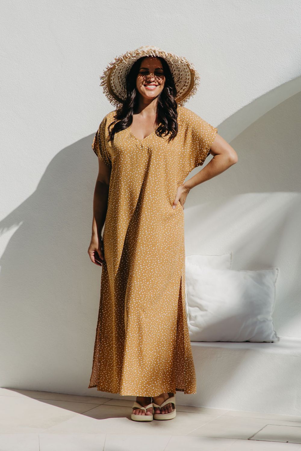 Front view of Caramel Scatter Dot Maxi Dress worn by size SM curve model