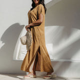 Side view showing side splits of Caramel Scatter Dot Maxi Dress on size SM model