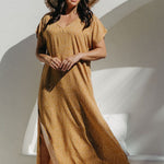 Walking motion shot showing side slit and dress movement on size SM model