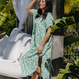 Side view of emerald green and white Sorrento print kaftan dress