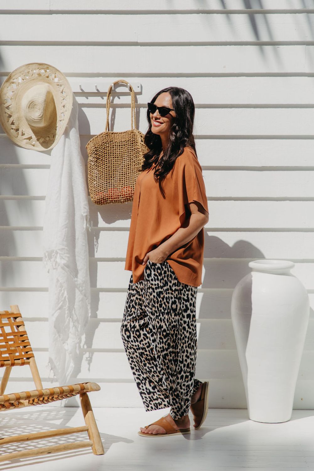 Side view of Alisha in Mocha Mousse Kaftan Top size S/M showing drape and tunic-length fall