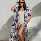 Maxi-length beach cover up with floral patchwork design