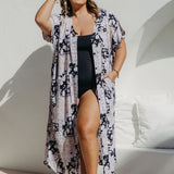 Woman wearing Patchwork Dreams Kimono Duster beach cover up