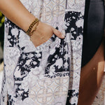 Maxi kimono duster styled open over swimmers at the beach with breezy movement