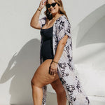 Boho resort kimono layered over swimwear