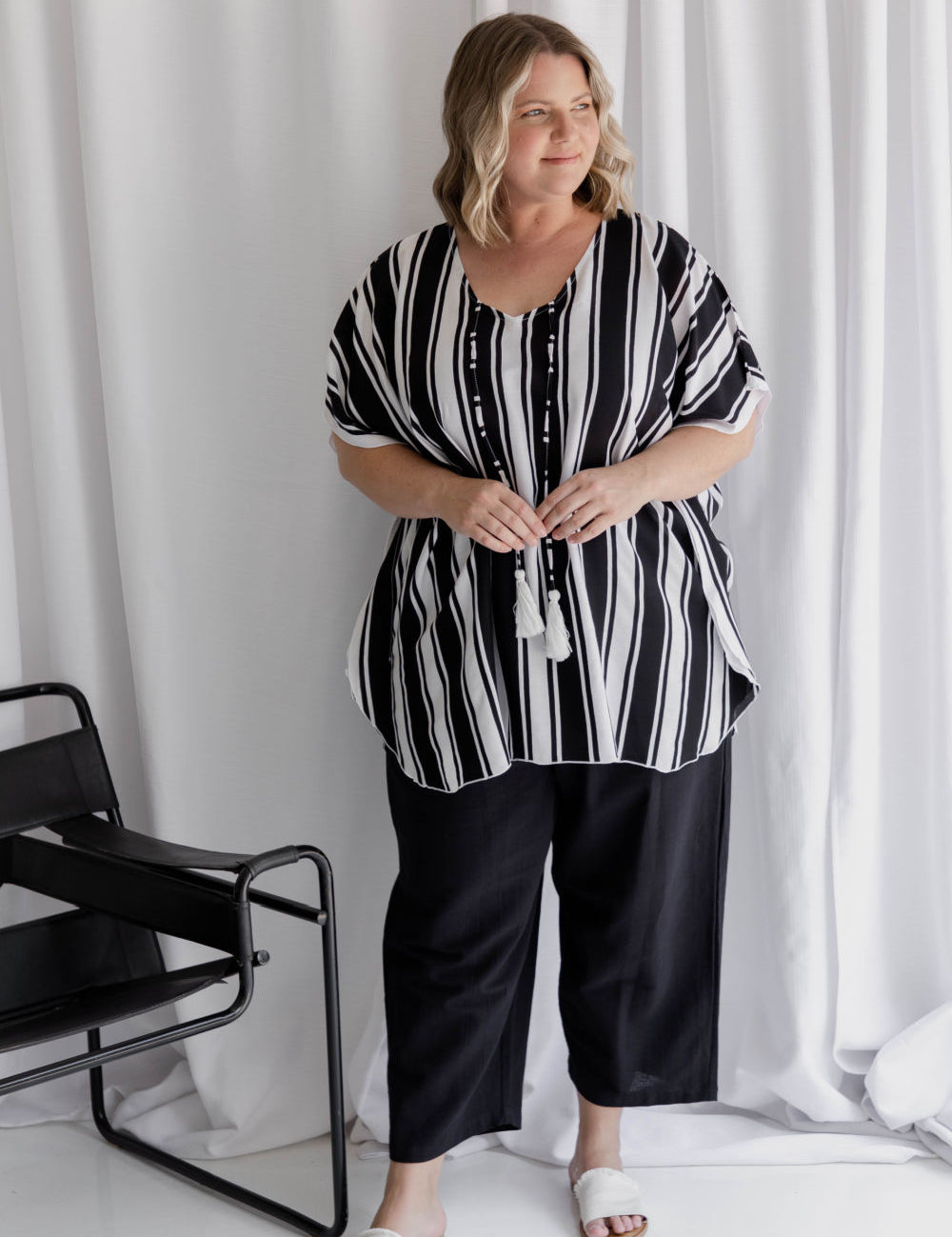  Analyzing image     ladies-kaftan-top-black-white-stripe