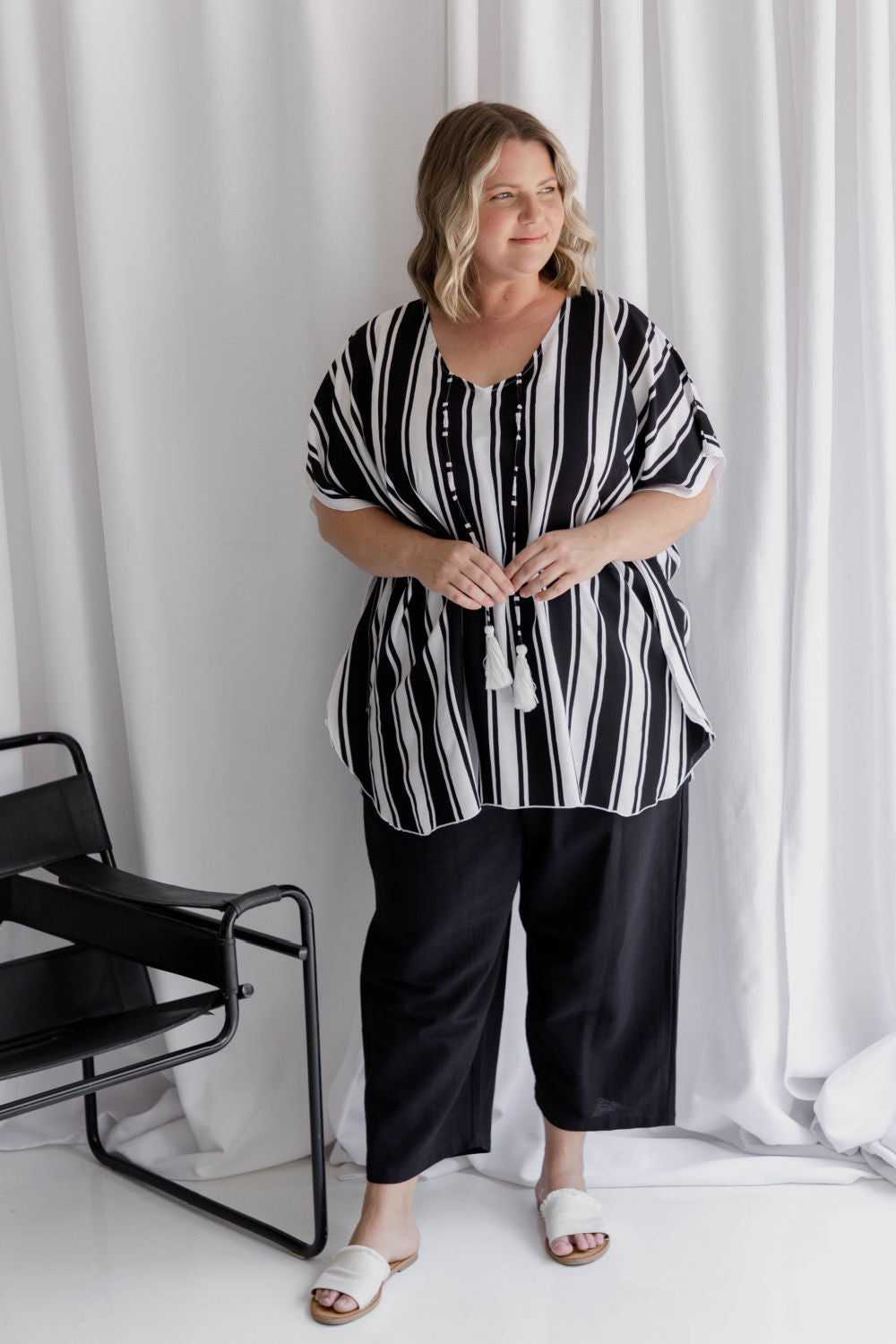  Analyzing image     ladies-kaftan-top-black-white-stripe