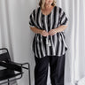  Analyzing image     ladies-kaftan-top-black-white-stripe