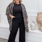 Front view of leopard print kimono cape with relaxed open drape