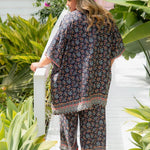 Back view of Liliana belted kimono jacket showing square hem