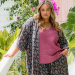 Plus size model wearing Liliana belted kimono jacket styled with matching palazzo pants