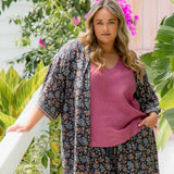 Plus size model wearing Liliana belted kimono jacket styled with matching palazzo pants
