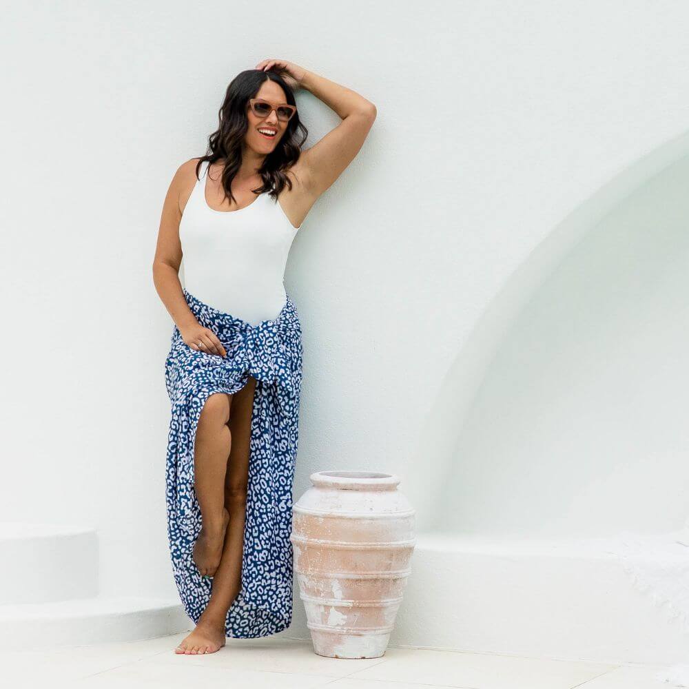 Model wearing blue leopard print large sarong from the limited edition collection