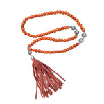 long-orange-beaded-necklace-leather-tassel-pendant