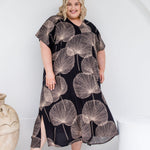  Analyzing image      long-summer-dress-plus-size-black-cream-leaf-design