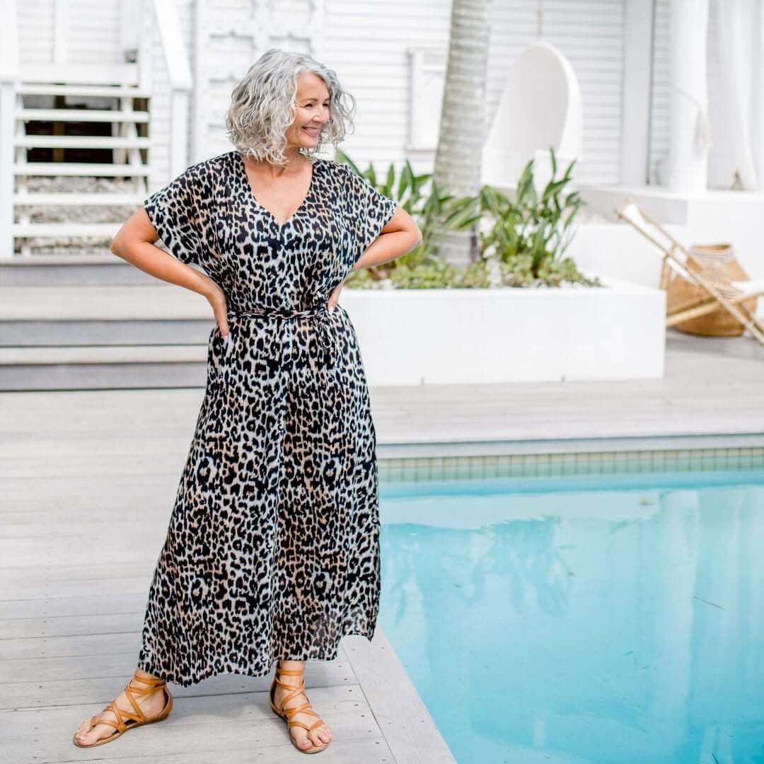 Model wearing Holley Day Signature Leopard print resort wear in belted Maxi Kaftan Dress design