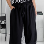 Close-up of black Palazzo Pants front – elastic waistband and drawstring tie detail