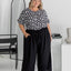 Amanda wearing black Palazzo Pants size L – full front view showing elastic waistband, drawstring, and pocket styling