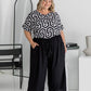 Amanda wearing black Palazzo Pants size L – full front view showing elastic waistband, drawstring, and pocket styling
