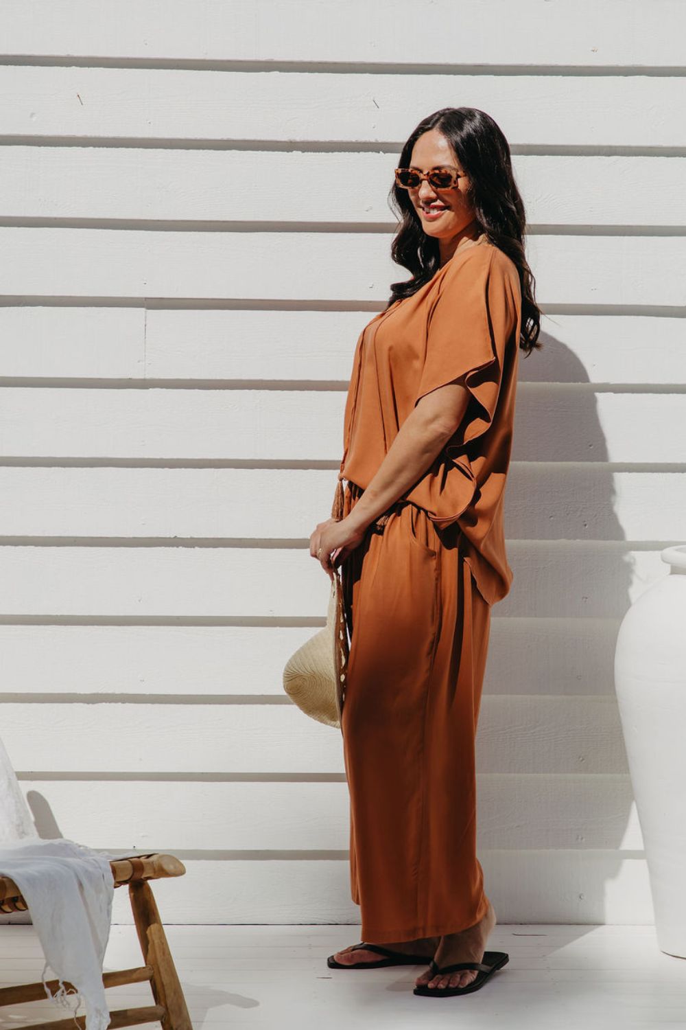 Full side view of Alisha wearing Mocha Mousse Palazzo Pants size M – wide-leg flow and relaxed fit