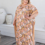    plus-size-long-kaftan-dress-resort-wear-peach-earth-tones-floral-border-design