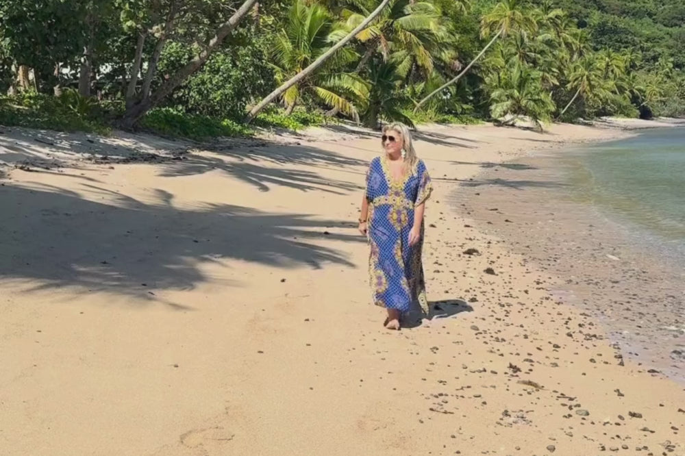 Wearing the Charley Long Kaftan strolling along Fiji beach