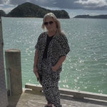 See how our Leopard Trio Resort Set looks on a real traveller enjoying a cruise stop in the beautiful Bay of Islands, New Zealand. Designed for women who want to feel stylish and comfortable while exploring the world, this coordinated three-piece outfit is perfect for cruise shore excursions, sightseeing, waterfront lunches and relaxed holiday evenings. Featuring a flowing leopard print kimono, classic black blouse and matching palazzo pants, it's effortless resort wear that travels beautifully.