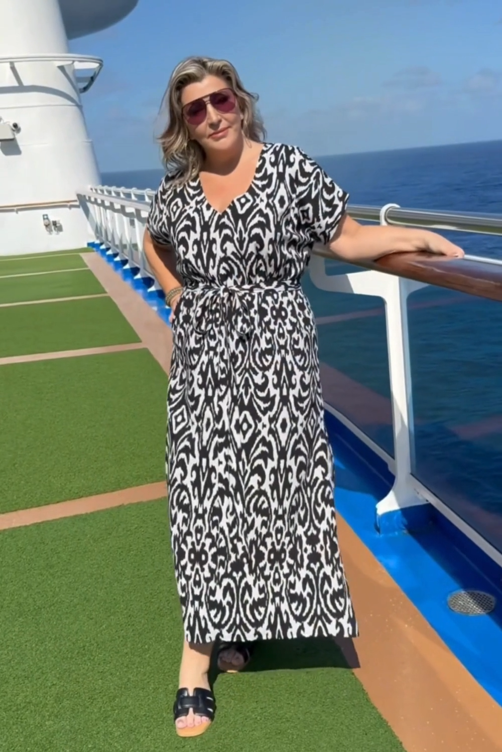 Woman-wearing-the-Sorrento-long-summer-dress-in-black-and-white-whilst-on-Carnival-cruise-of-Queensland-coast