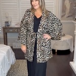 Outfit set of Black Maxi Dress with Leopard Jacket layered over by Regina