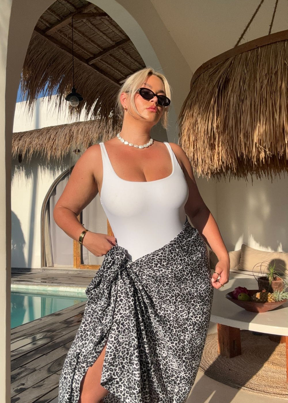 woman wearing xl leopard print sarong at Bali pool villa 