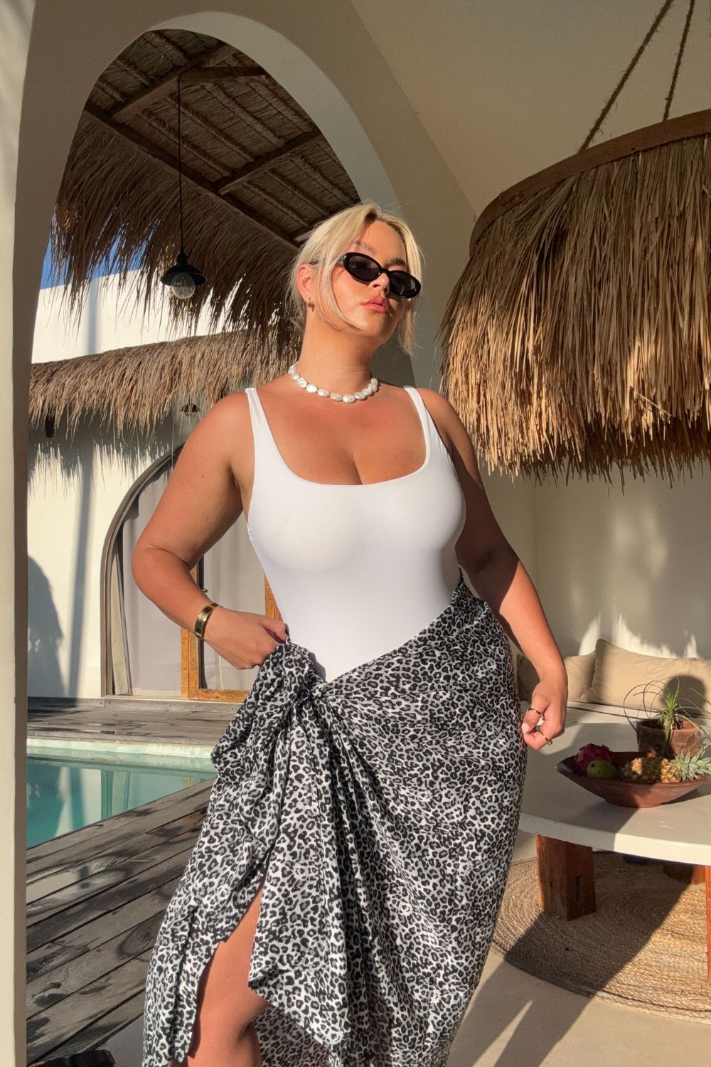 woman wearing xl leopard print sarong at Bali pool villa 