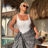 woman wearing xl leopard print sarong at Bali pool villa 