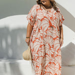 Curvy model styling Shell Maxi Kaftan in Pomegranate for a relaxed resort look