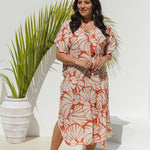 Woman wearing Shell Maxi Kaftan in Pomegranate with bold shell print